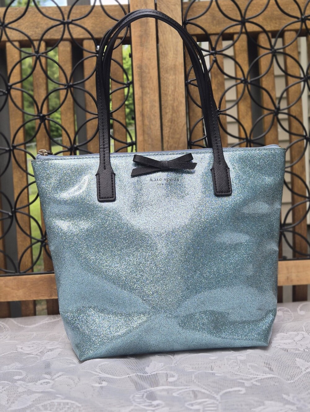 kate spade teal glitter tote with black handles